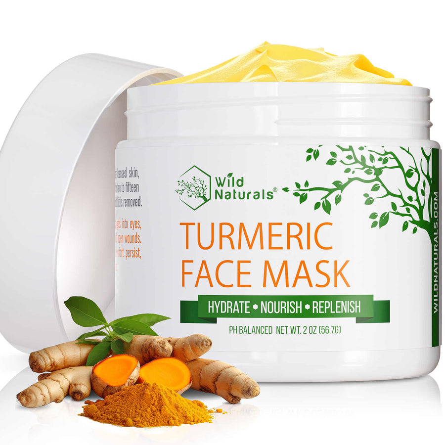 Wild Naturals Turmeric Face Mask in a 2oz jar with fresh turmeric root and powder. A hydrating, pH balanced yellow clay mask designed to nourish and replenish skin for a natural glow.